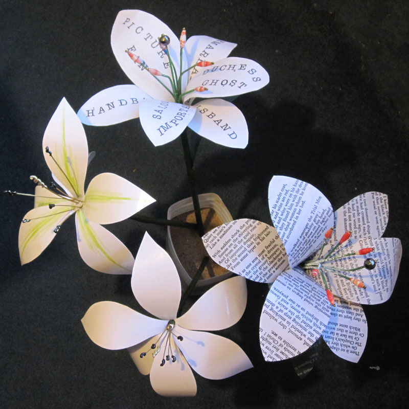 Four lilies made from paper