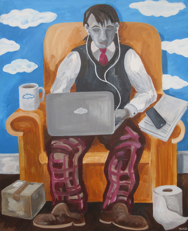 Man sitting in an armchair with his home office